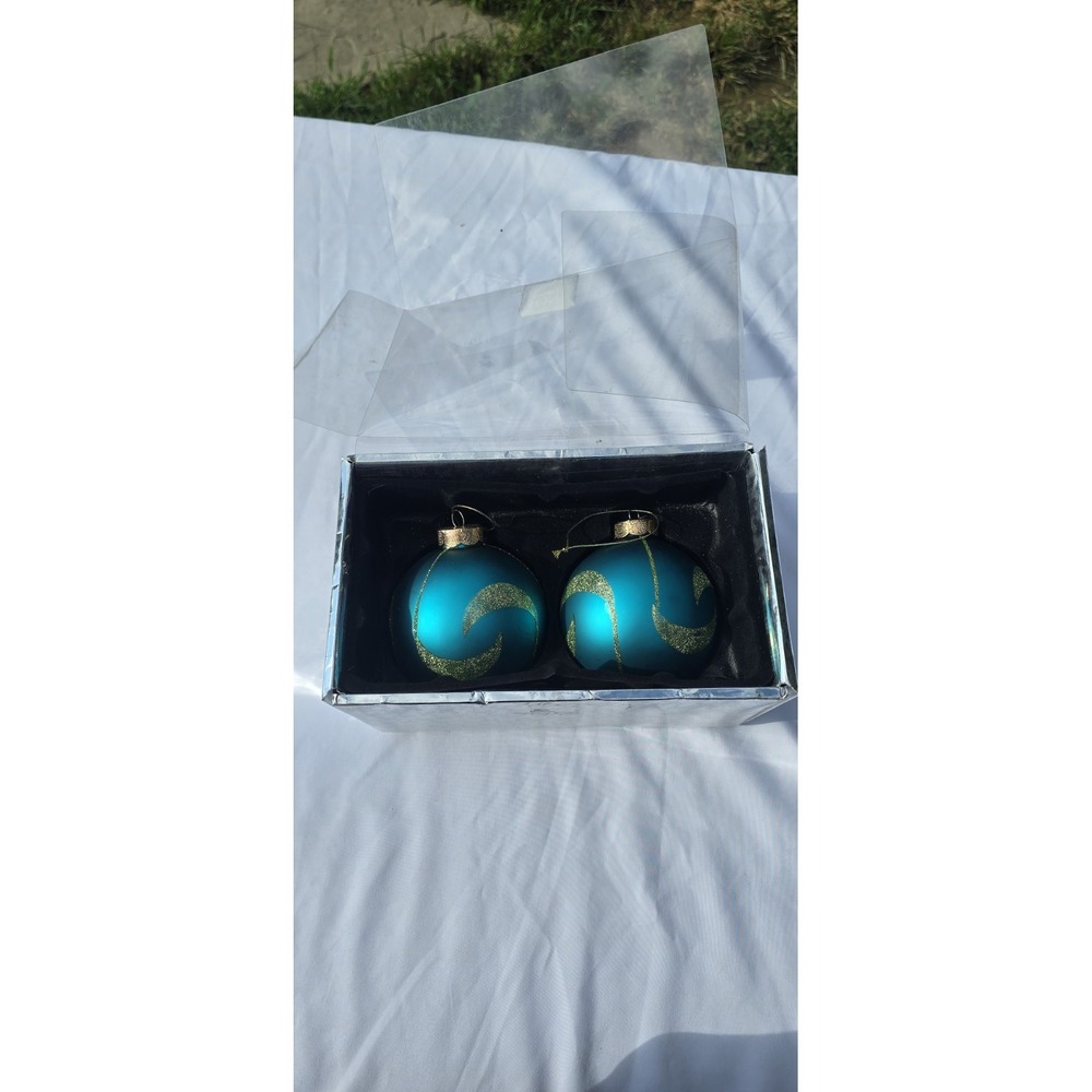 set of matte turquoise glass Christmas ball ornaments with gold glitter designs